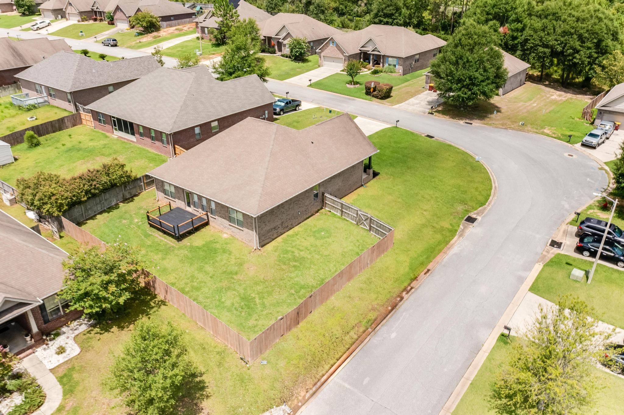 750 Lime Lane Crestview, FL 32536 - Photo 47 of 51 an aerial view of a house with swimming pool and outdoor seating