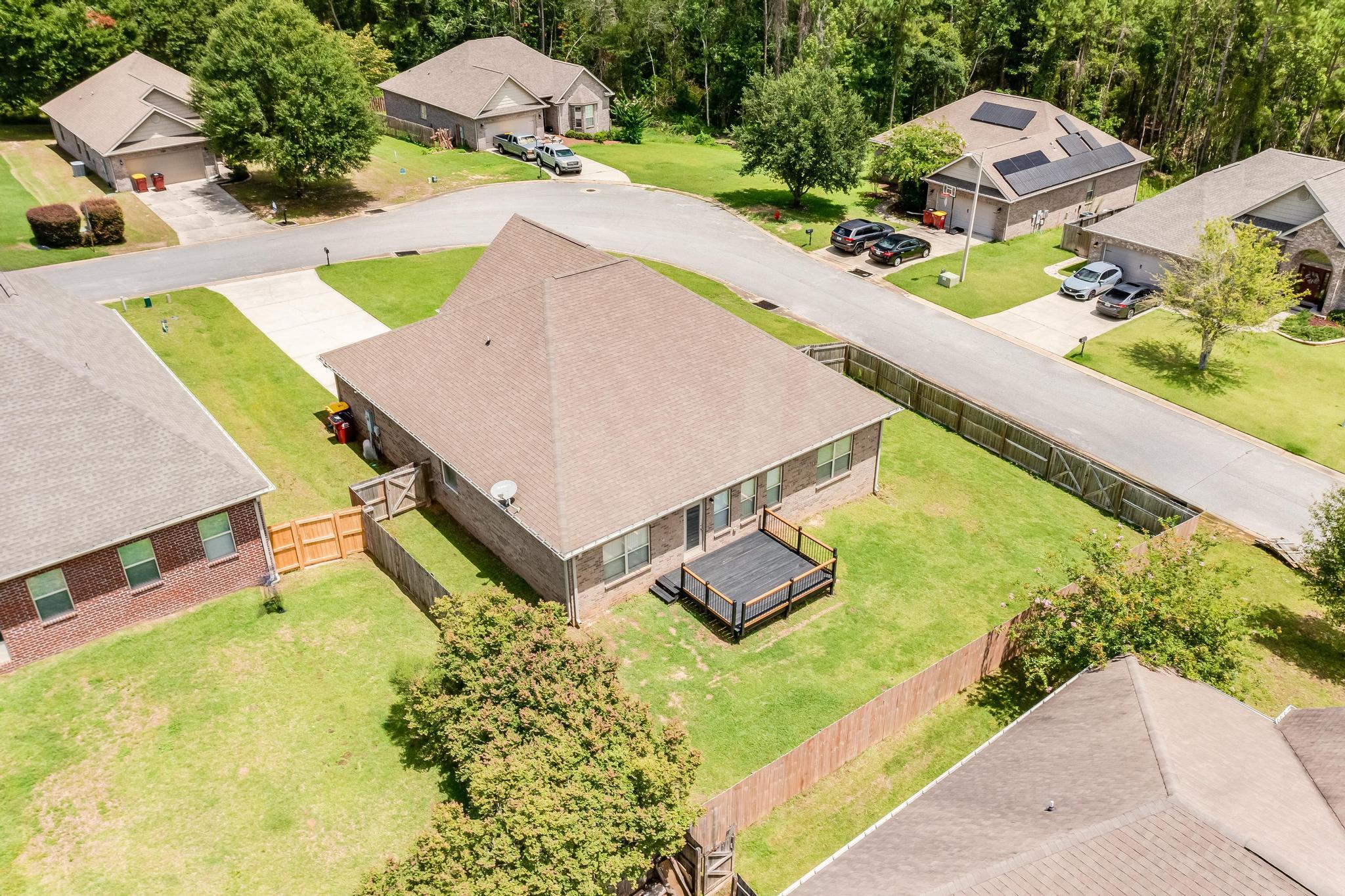 750 Lime Lane Crestview, FL 32536 - Photo 48 of 51 an aerial view of a house with a swimming pool