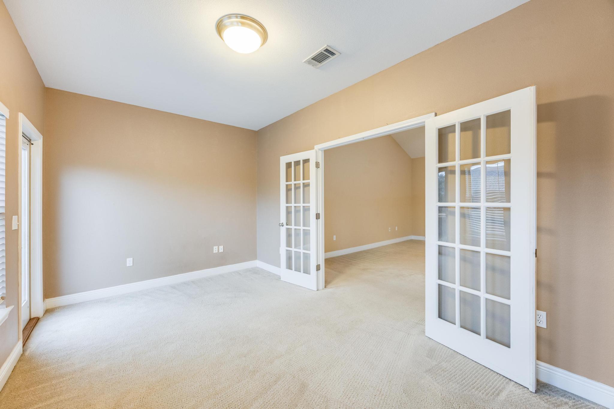 750 Lime Lane Crestview, FL 32536 - Photo 9 of 51 a view of an empty room with a window