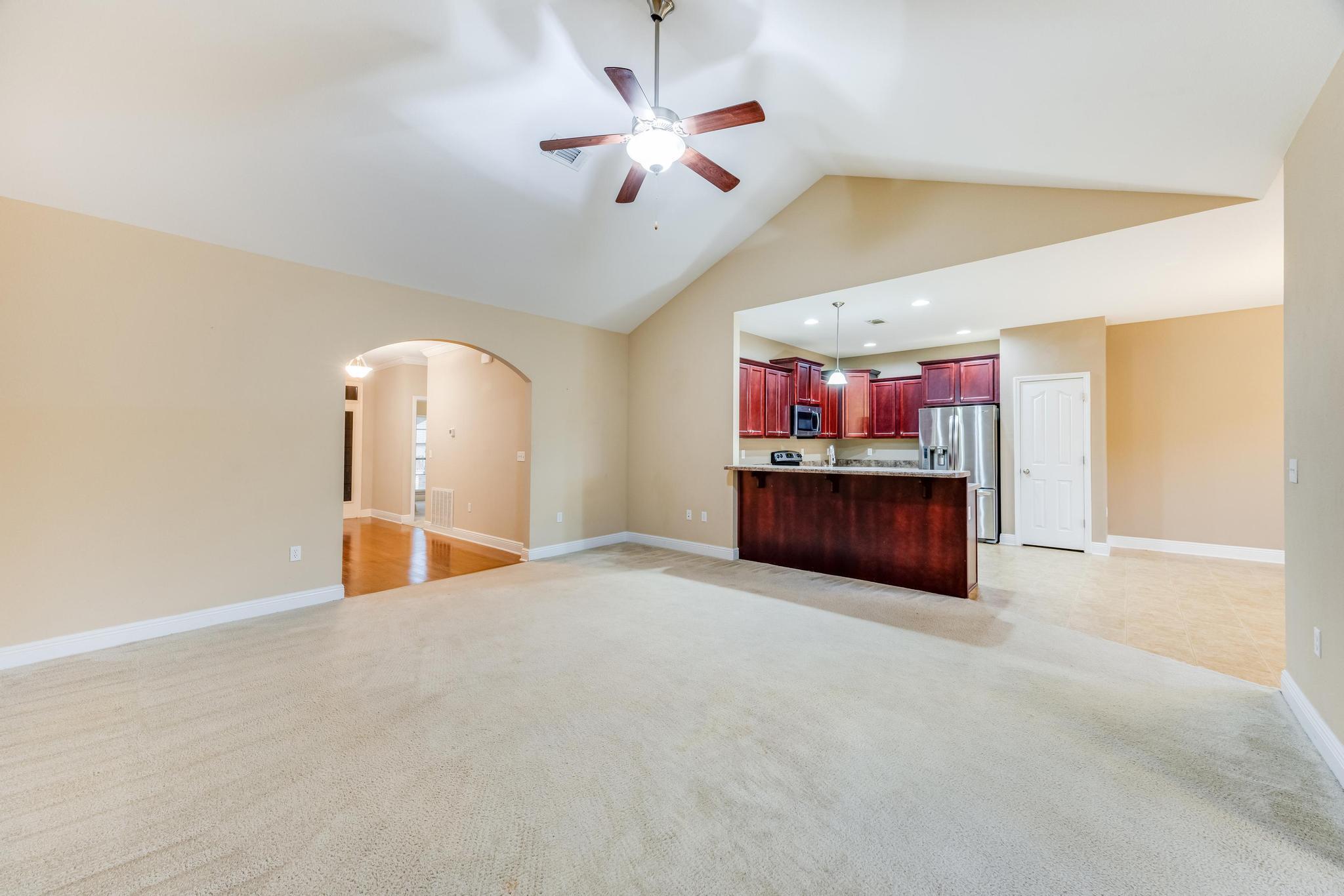750 Lime Lane Crestview, FL 32536 - Photo 10 of 51 an empty room with cabinet and ceiling fan