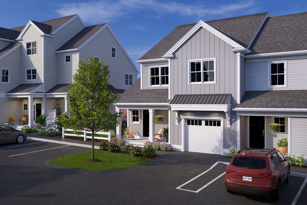 7 Oxbow Road, Unit 51 Raynham, MA 02767 - Photo 17 of 40 a car parked in front of a house