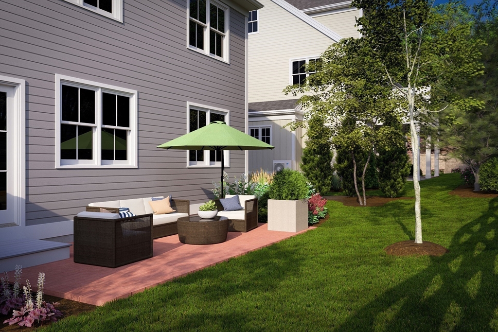 7 Oxbow Road, Unit 51 Raynham, MA 02767 - Photo 2 of 40 a view of a house with backyard and sitting area