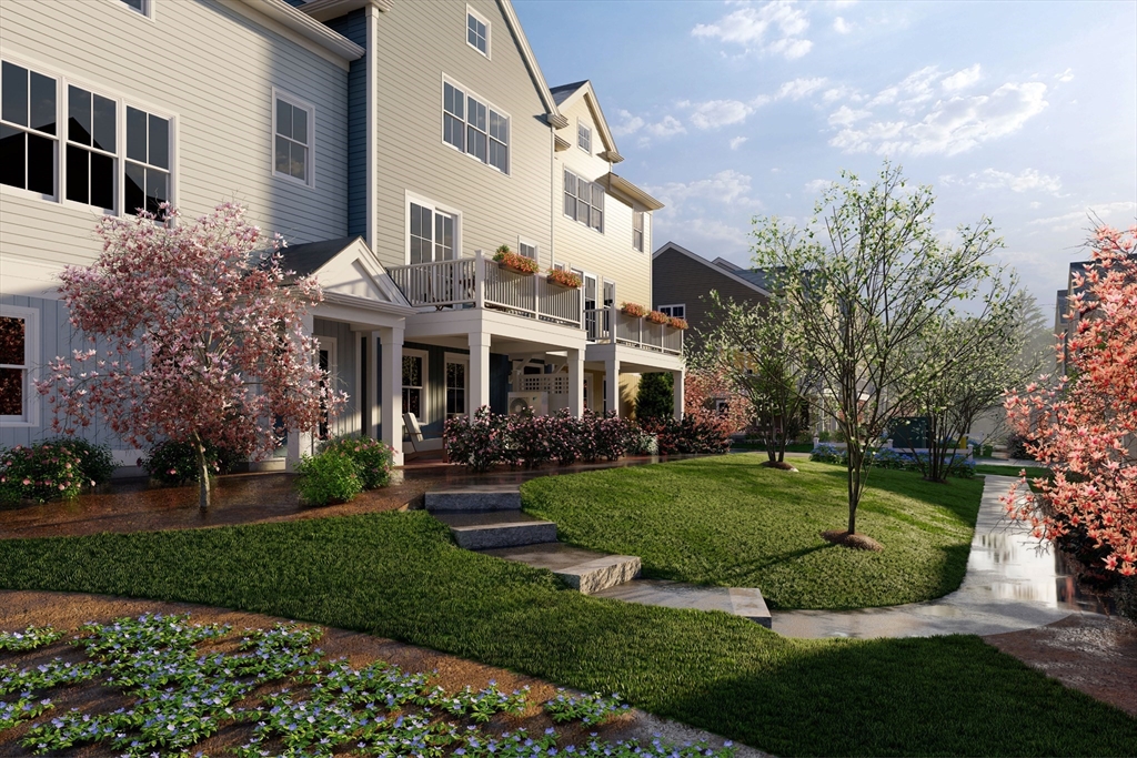 7 Oxbow Road, Unit 51 Raynham, MA 02767 - Photo 36 of 40 a view of a building with a yard