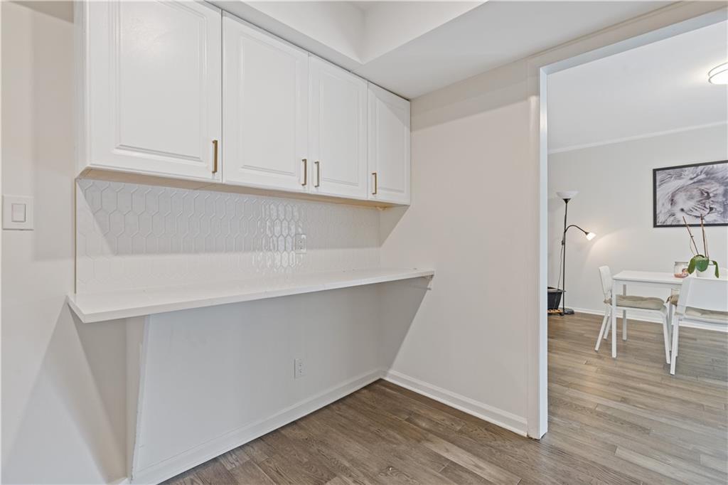 3236 Henderson Mill Road, Unit 1 Chamblee, GA 30341 - Photo 14 of 23 a view of workspace with wooden floor