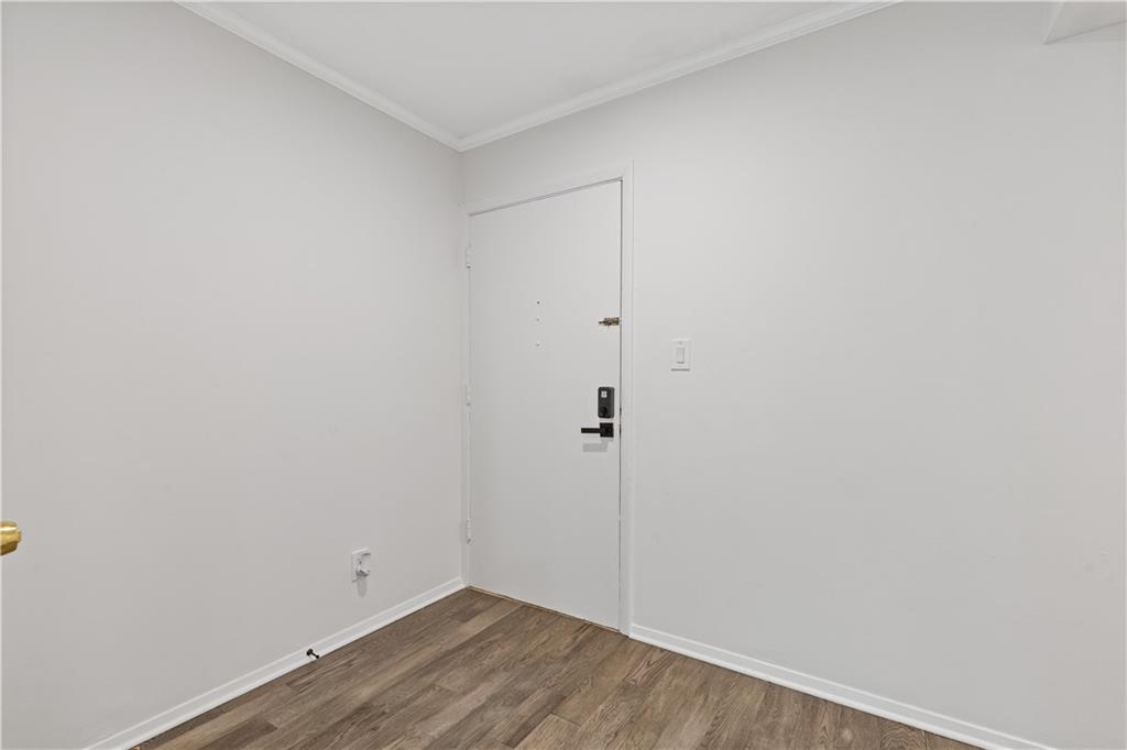 3236 Henderson Mill Road, Unit 1 Chamblee, GA 30341 - Photo 6 of 23 a view of small space with wooden floor