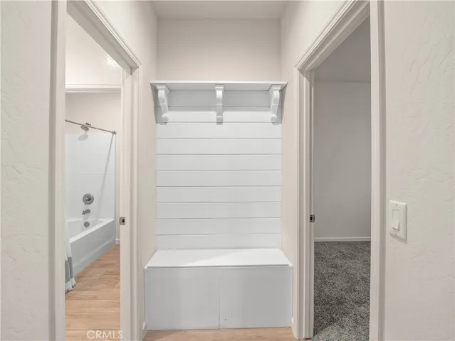 a bathroom with a bathtub and shower