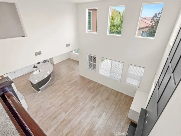 a view of a living room and wooden floor