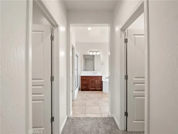 a bathroom with a glass door shower