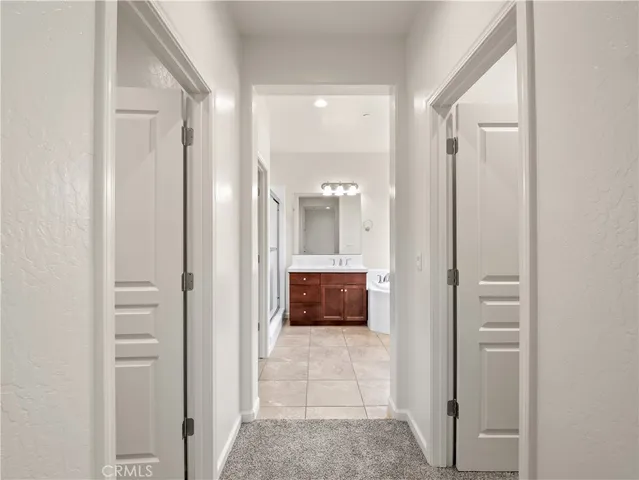a bathroom with a glass door shower