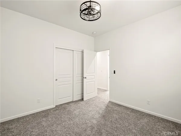 a view of a hallway with entryway