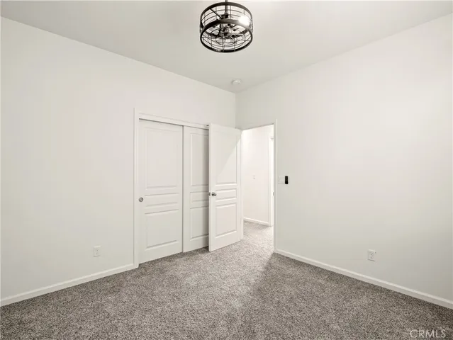 a view of a hallway with entryway