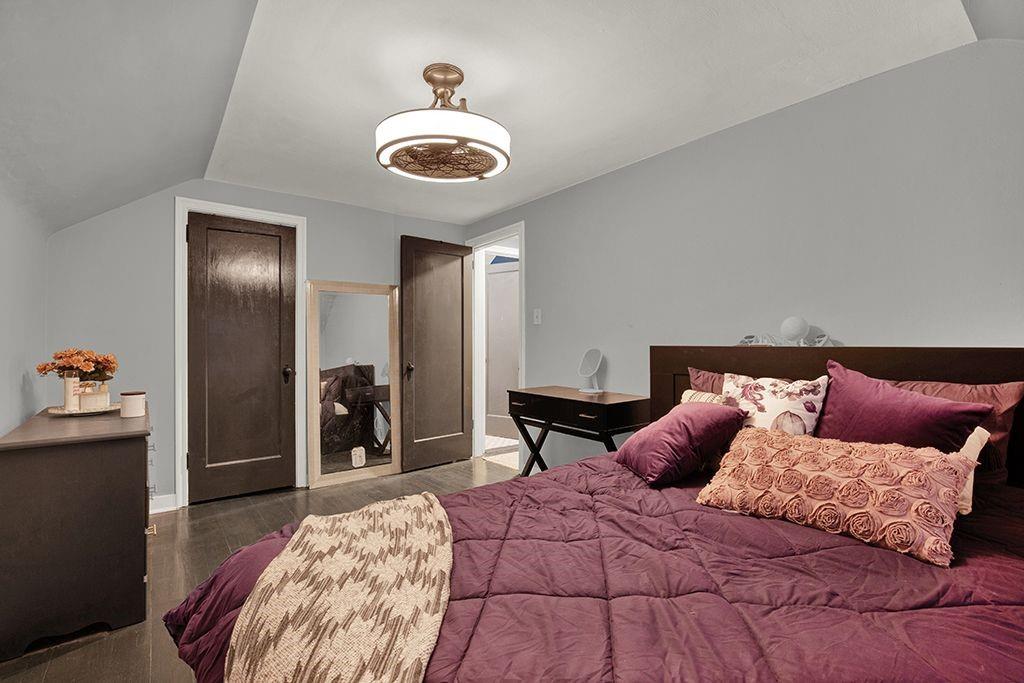 1034 McCoy Road McKees Rocks, PA 15136 - Photo 12 of 22 a bedroom with a bed and a chandelier