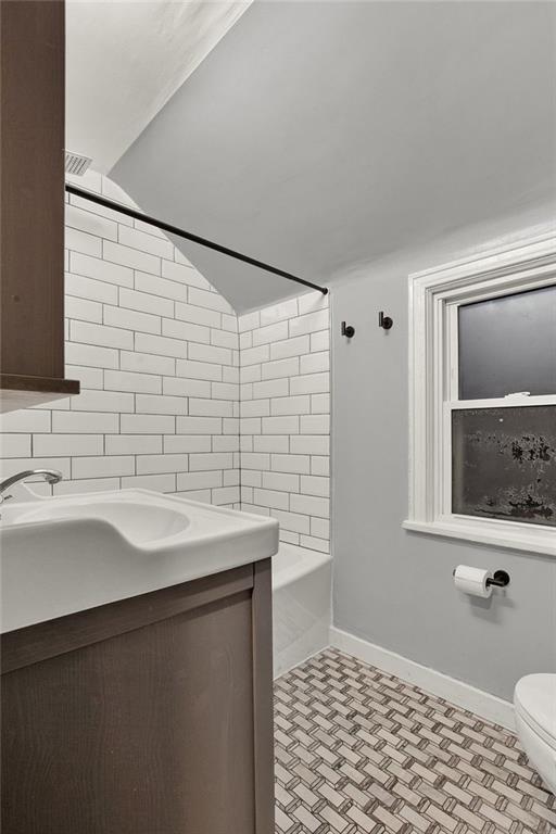 1034 McCoy Road McKees Rocks, PA 15136 - Photo 14 of 22 a bathroom with a sink a toilet and mirror