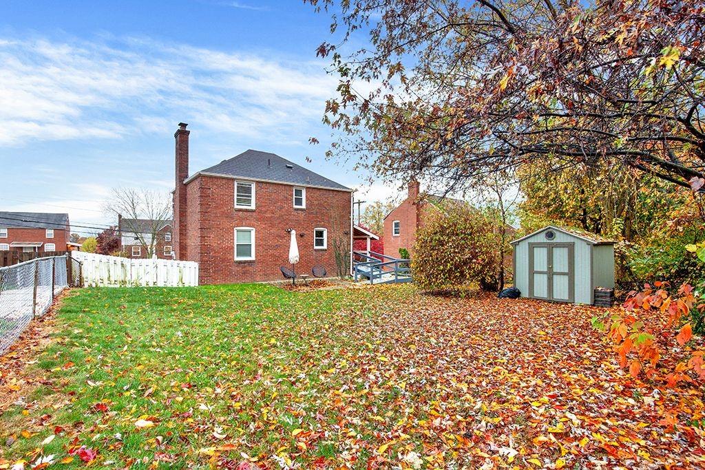 1034 McCoy Road McKees Rocks, PA 15136 - Photo 19 of 22 a front view of a house with a yard