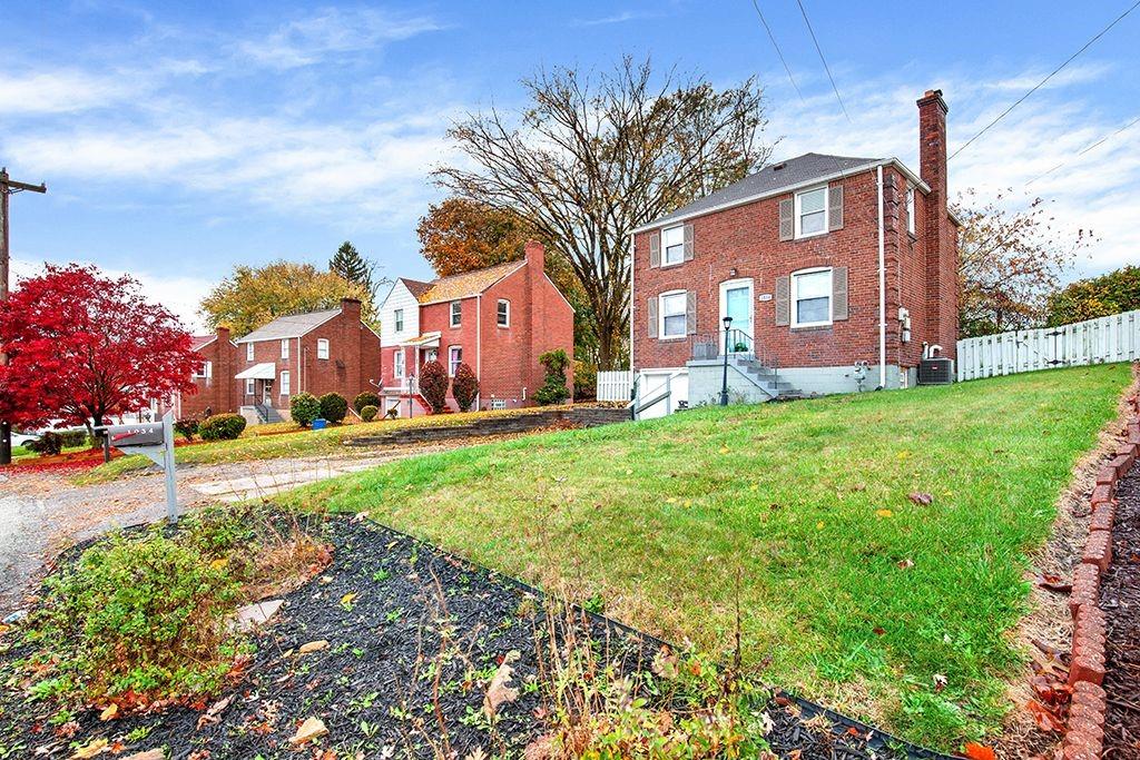 1034 McCoy Road McKees Rocks, PA 15136 - Photo 22 of 22 a view of a house with a yard