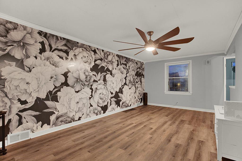 1034 McCoy Road McKees Rocks, PA 15136 - Photo 3 of 22 a view of wooden floor in a room