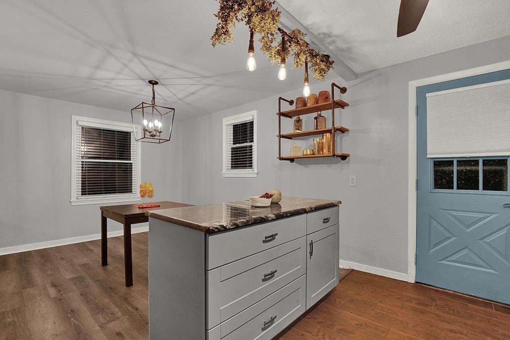 1034 McCoy Road McKees Rocks, PA 15136 - Photo 7 of 22 a room with chandelier fan and wooden floor