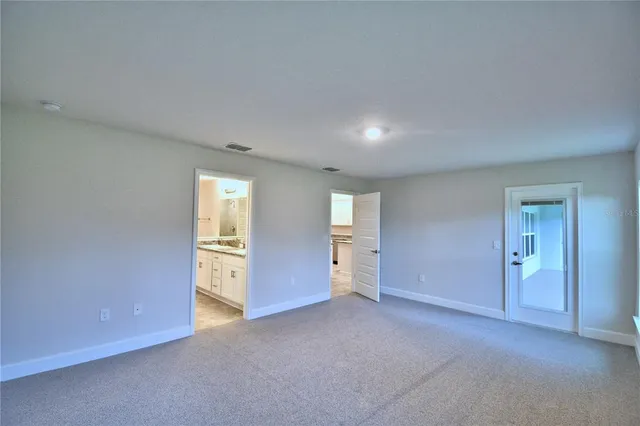 a bathroom with a tub a sink and a shower
