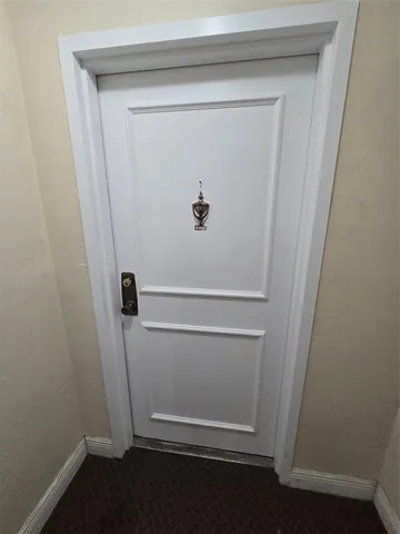 a view of a livingroom with wooden floor