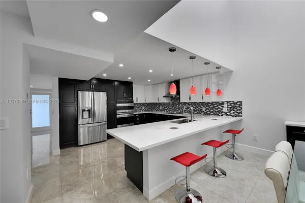 a table and chairs in a kitchen