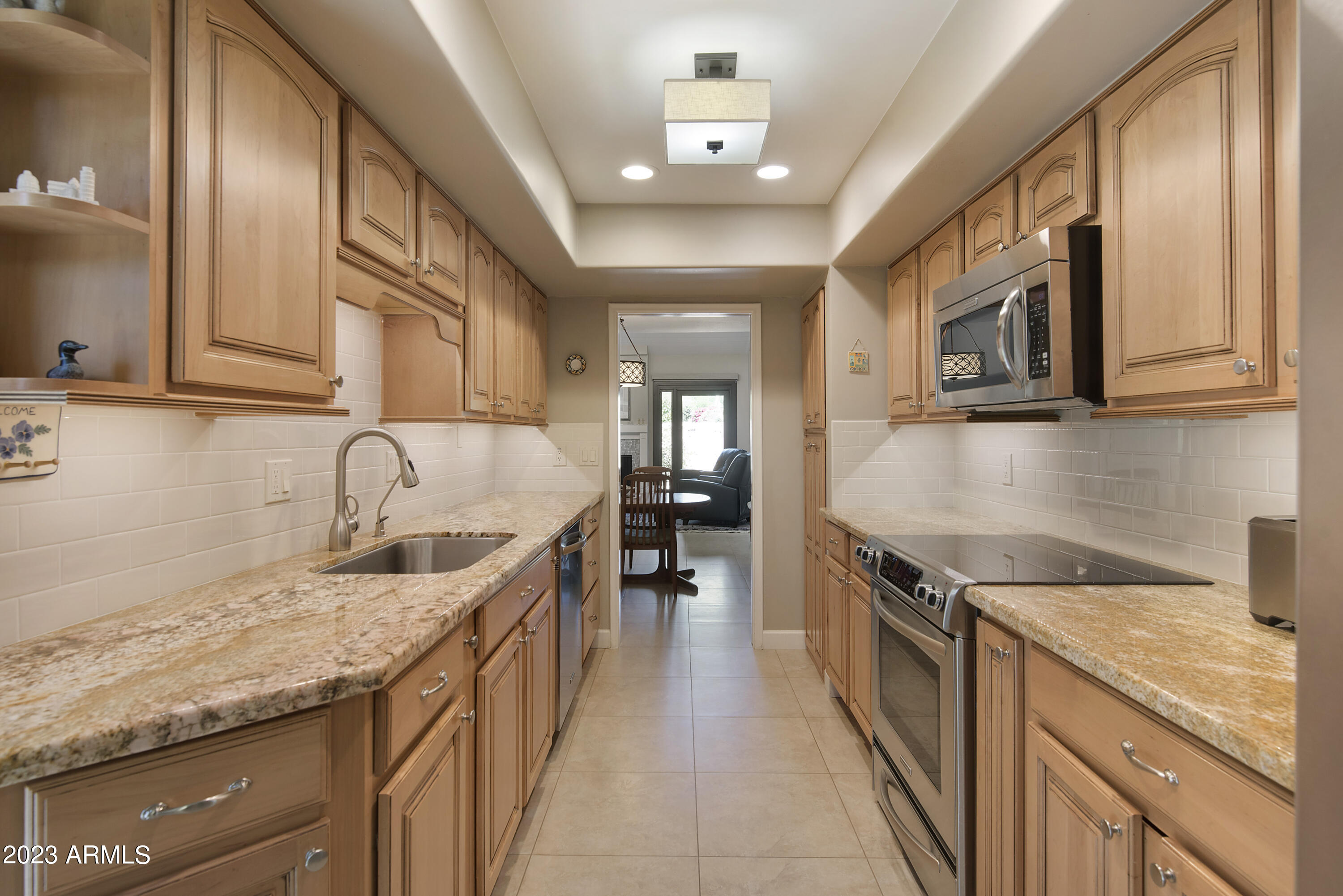 4442 East Camelback Road, Unit 163 Phoenix, AZ 85018 - Photo 25 of 38 Kitchen to Living