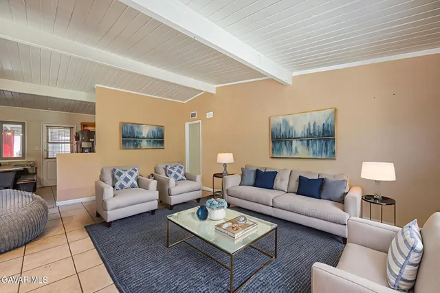 a living room with furniture and a couch