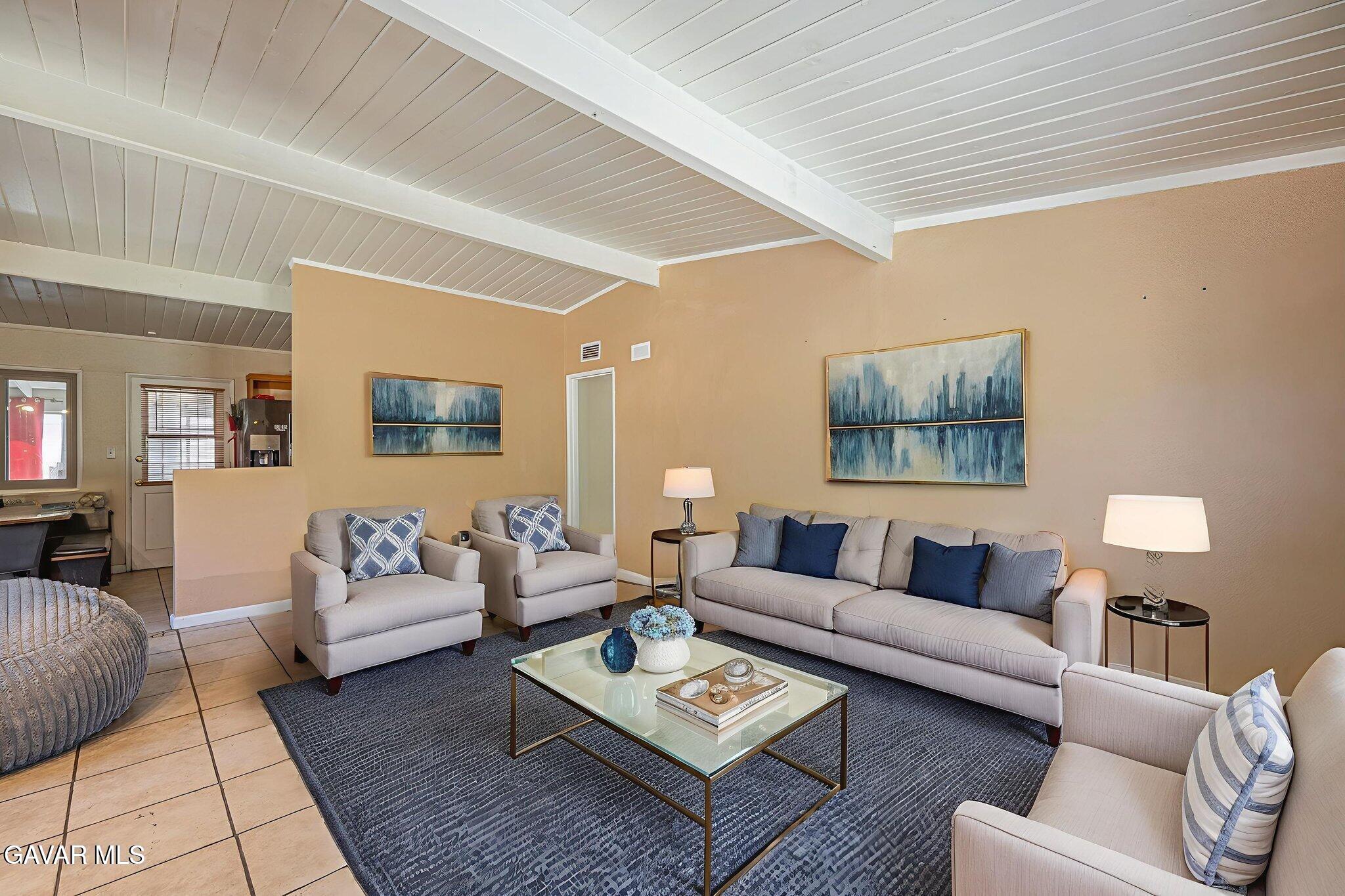 1342 Ave H 15 Lancaster, CA 93534 - Photo 9 of 15 a living room with furniture and a couch