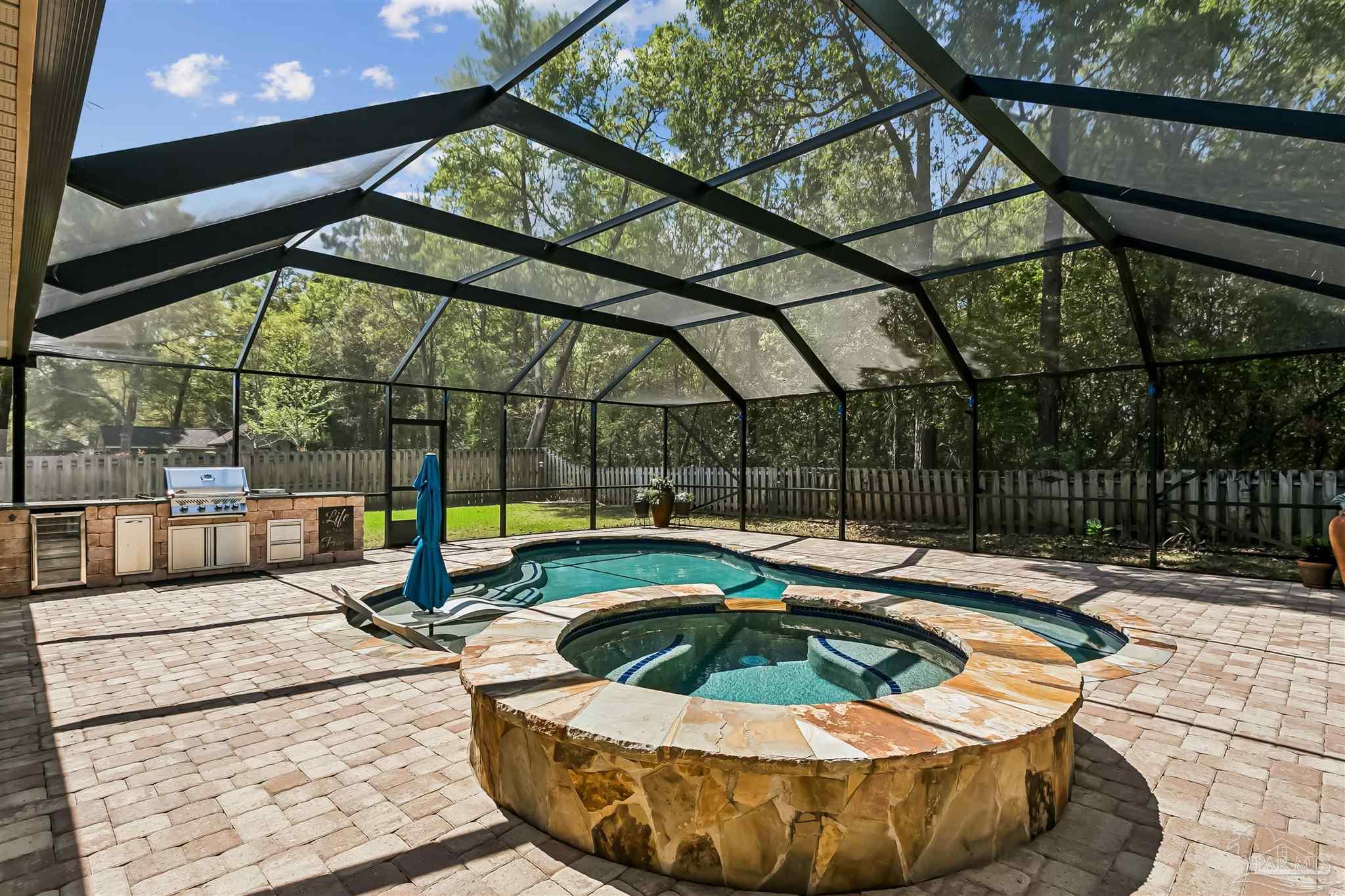 8414 Foxtail Loop Pensacola, FL 32526 - Photo 1 of 22 a view of outdoor space with swimming pool