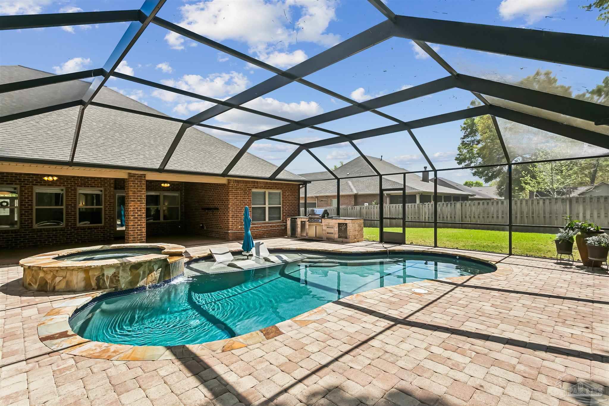 8414 Foxtail Loop Pensacola, FL 32526 - Photo 19 of 22 a view of a swimming pool with a lounge chairs