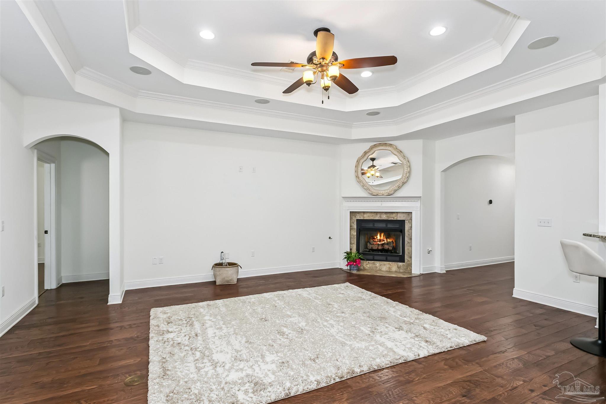 8414 Foxtail Loop Pensacola, FL 32526 - Photo 7 of 22 a view of an empty room and fire place