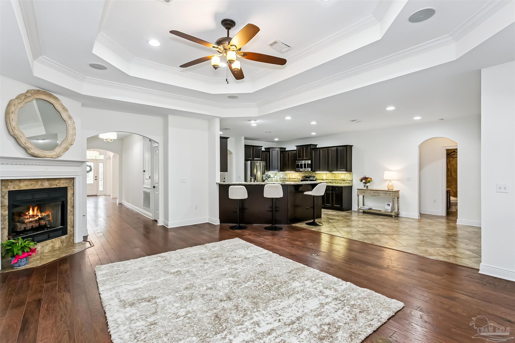 8414 Foxtail Loop Pensacola, FL 32526 - Photo 8 of 22 a living room with furniture and kitchen view