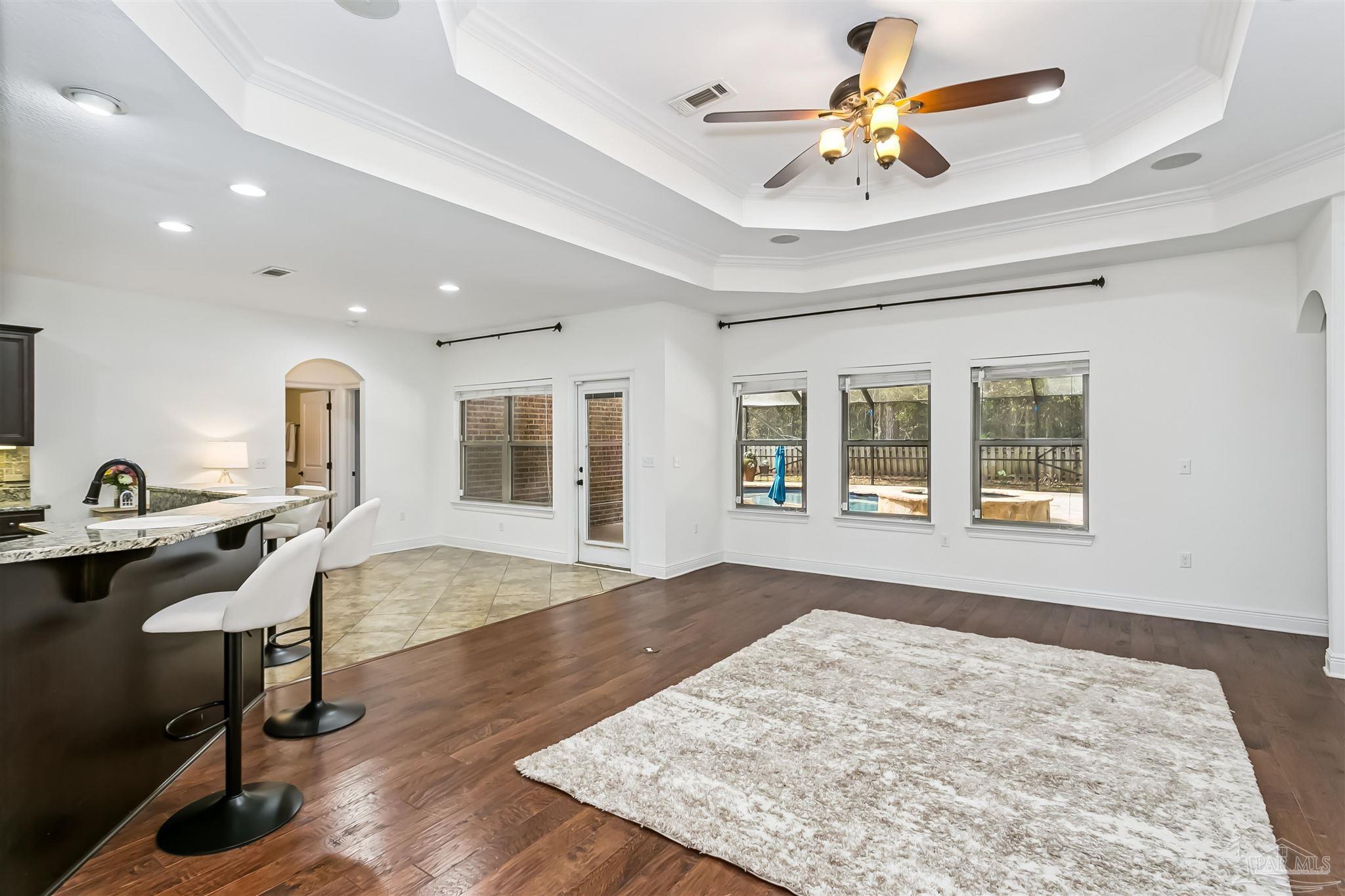 8414 Foxtail Loop Pensacola, FL 32526 - Photo 9 of 22 a view of a workspace with furniture and a window
