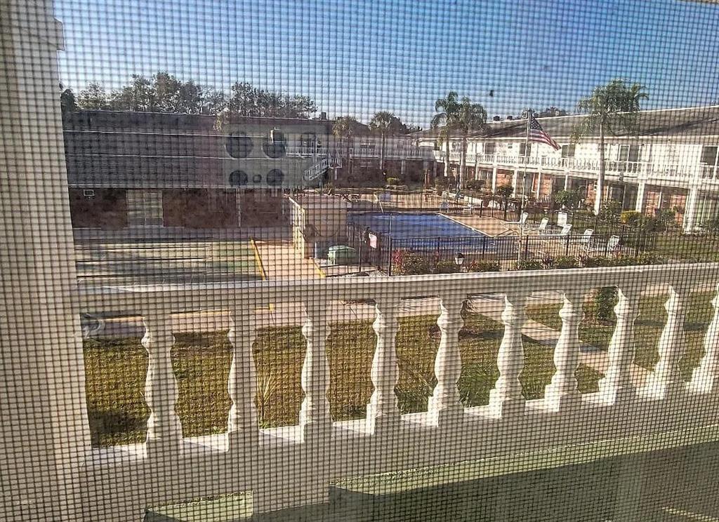 4744 Azalea Drive, Unit 204 New Port Richey, FL 34652 - Photo 16 of 20 a view of a brick building