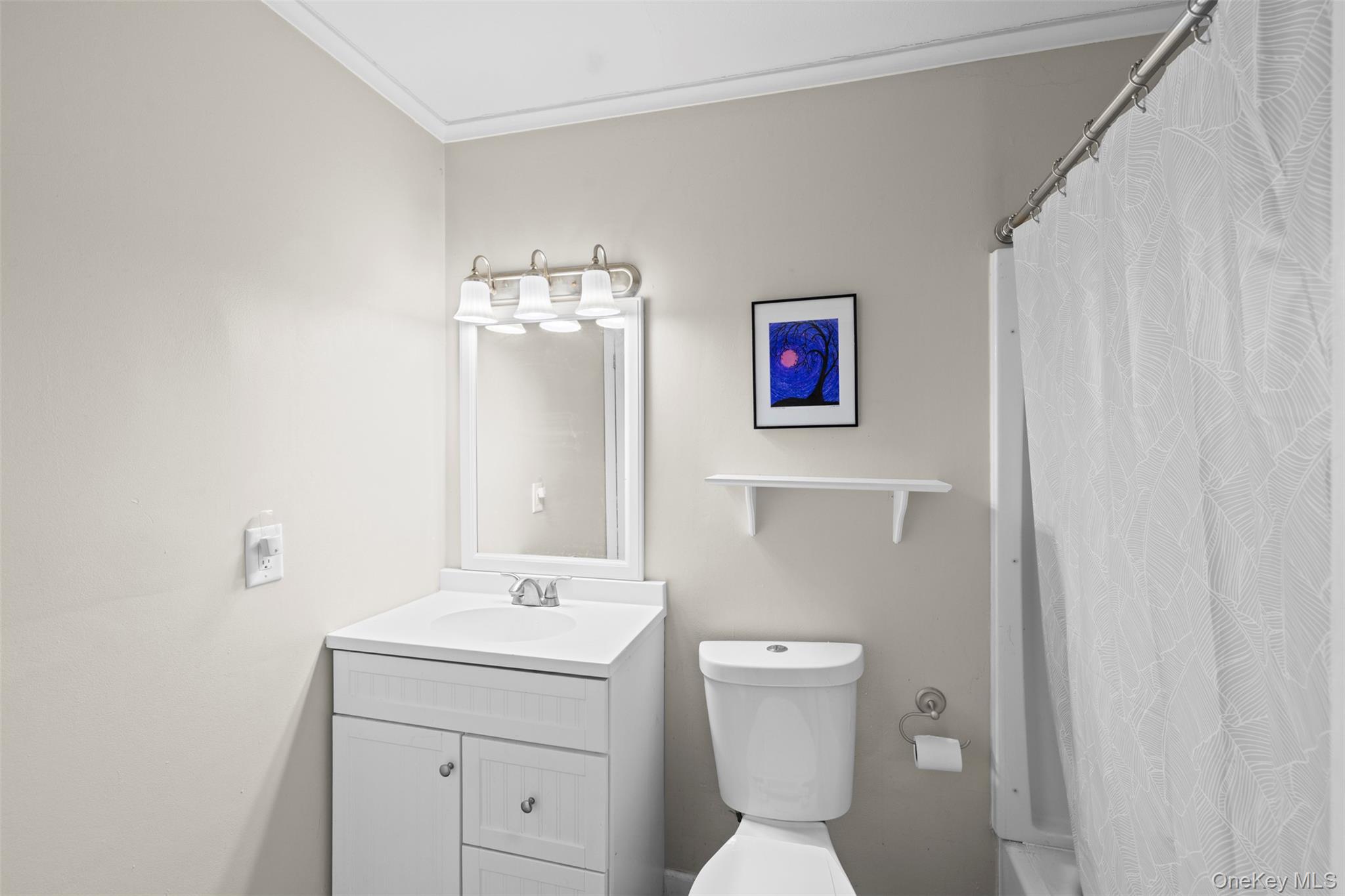 44 Woods Road Tivoli, NY 12583 - Photo 11 of 25 a bathroom with a toilet sink and mirror
