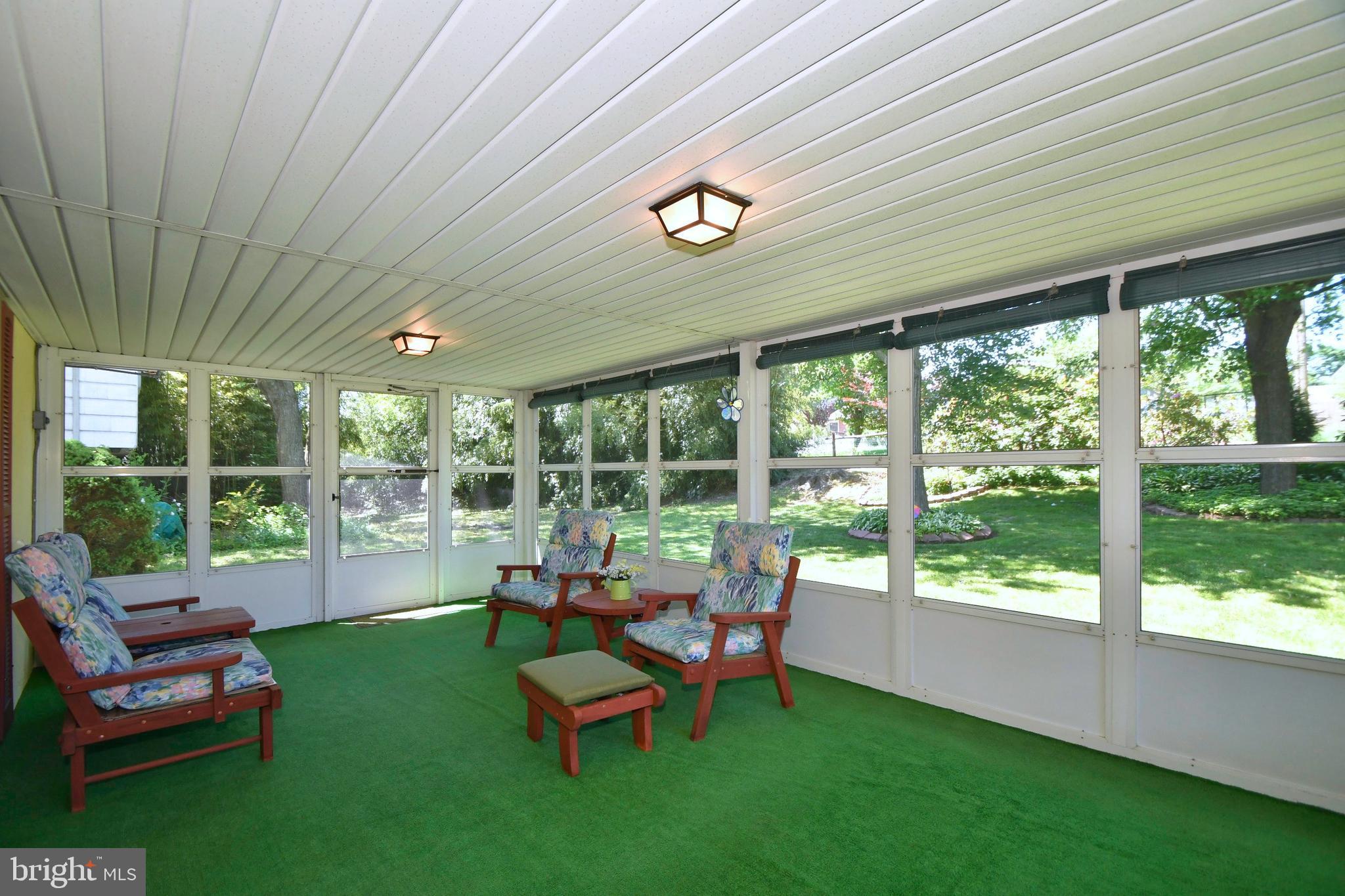 4421 Wynn Road Baltimore, MD 21236 - Photo 29 of 40 Screened porch overlooking backyard