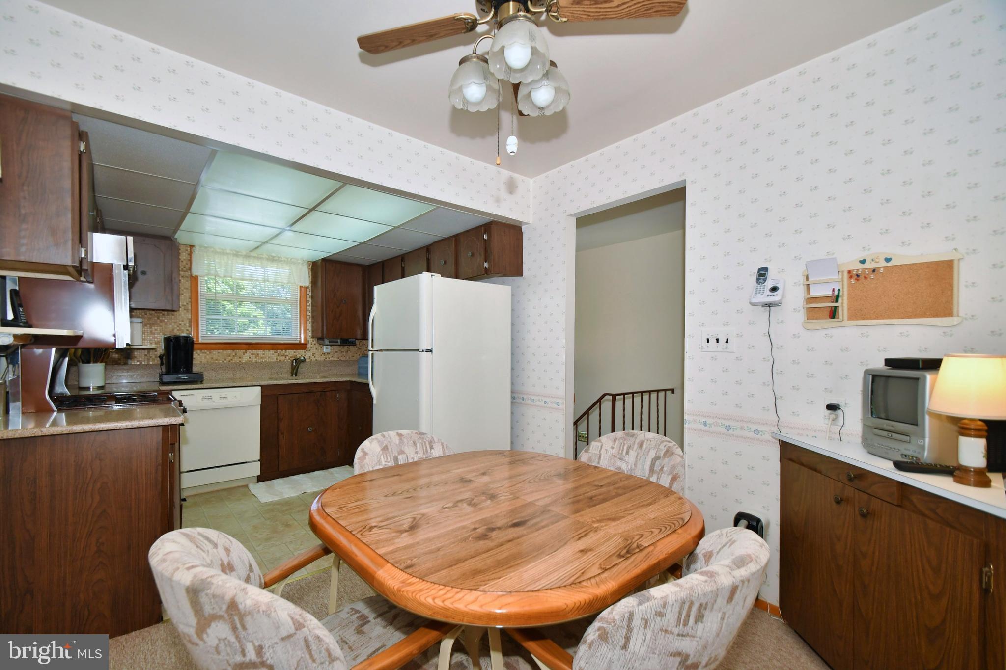 4421 Wynn Road Baltimore, MD 21236 - Photo 9 of 40 Kitchen with table space and ceiling fan