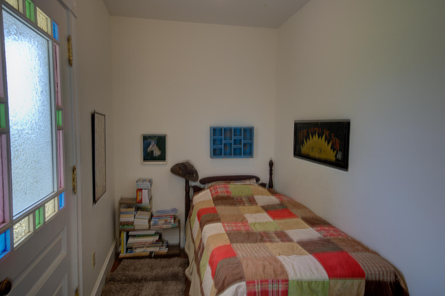 22245 Erickson Road Bend, OR 97701 - Photo 53 of 83 a bedroom with a bed and a painting on the wall
