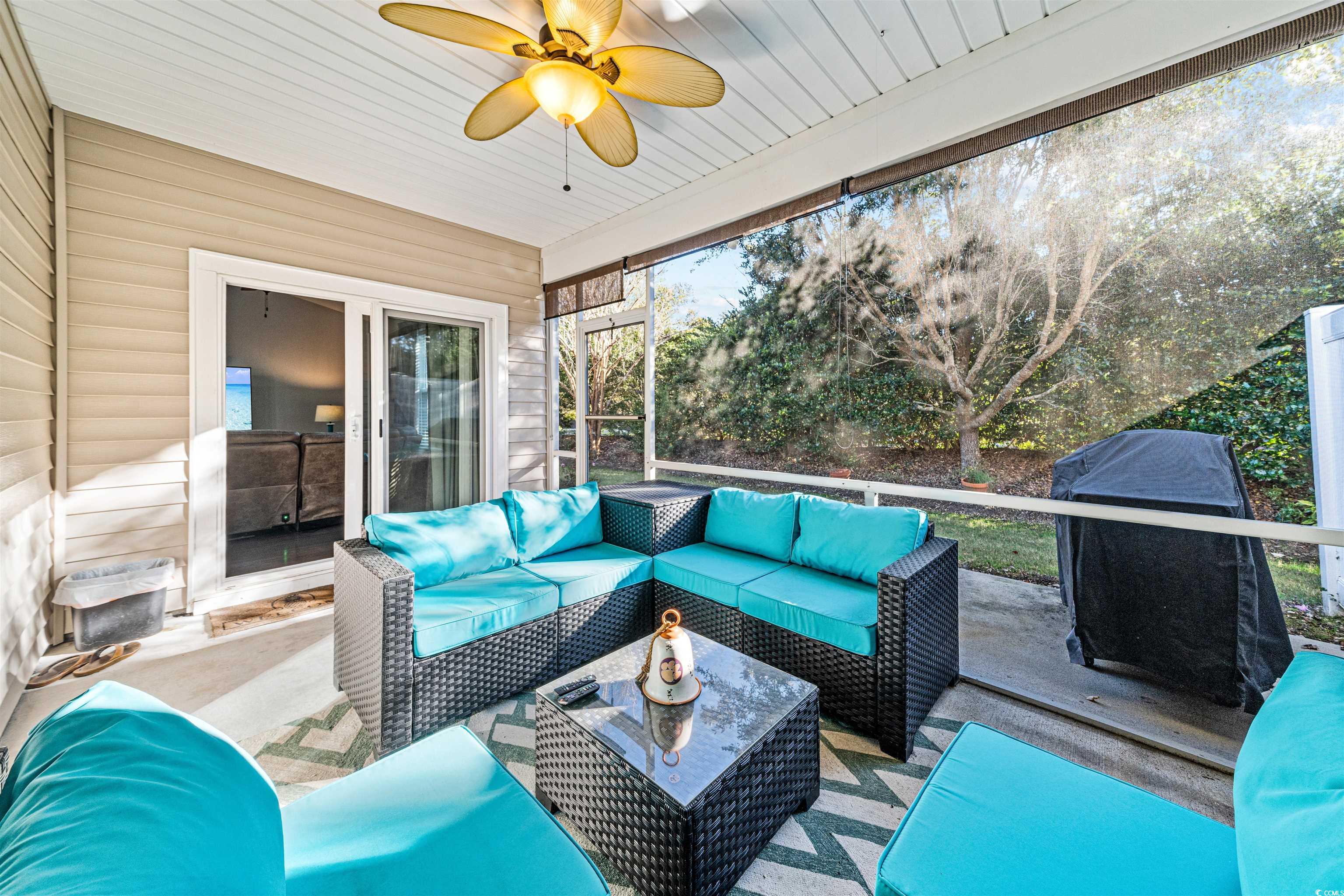 136 Parmelee Drive, Unit C Murrells Inlet, SC 29576 - Photo 24 of 40 Deck featuring a ceiling fan, grilling area, a patio area, and outdoor lounge area