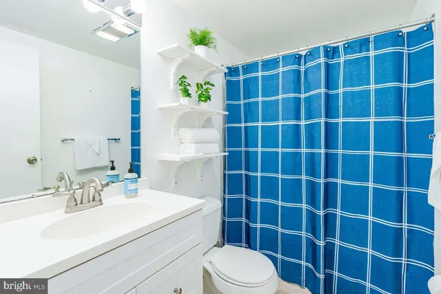 a view of a deck with wooden floor and outdoor seating
