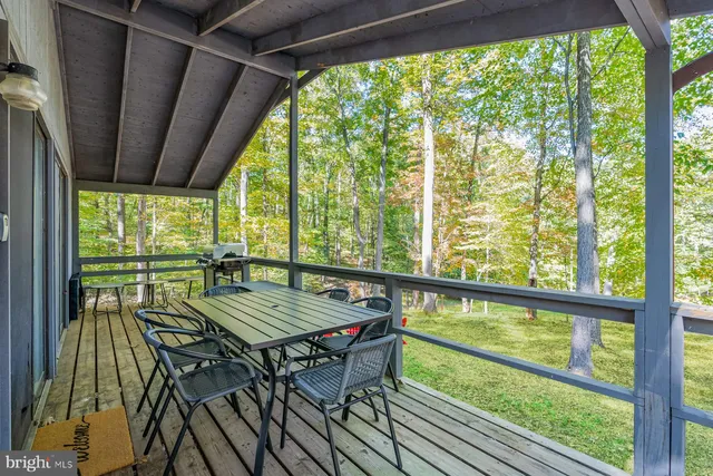 a view of a kitchen with a sink and a yard