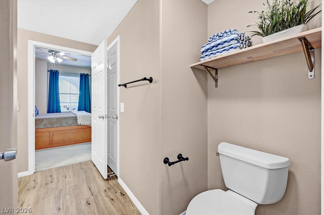 10550 West Alexander Road, Unit 1097 Las Vegas, NV 89129 - Photo 13 of 37 Primary bathroom connects to the adjacent primary bedroom suite.