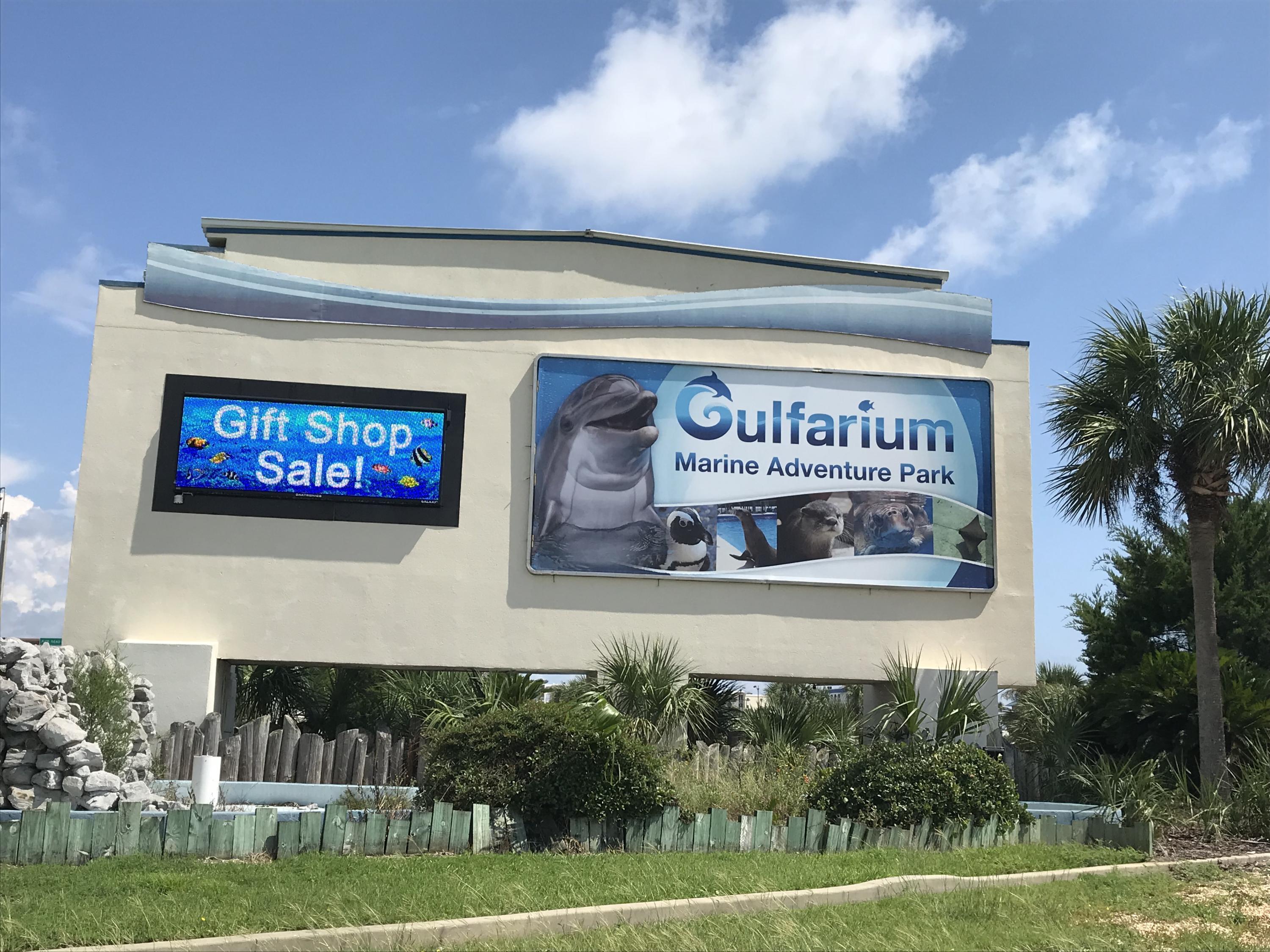 1114 Santa Rosa Boulevard, Unit 102 Fort Walton Beach, FL 32548 - Photo 17 of 23 a sign that is on the side of a building