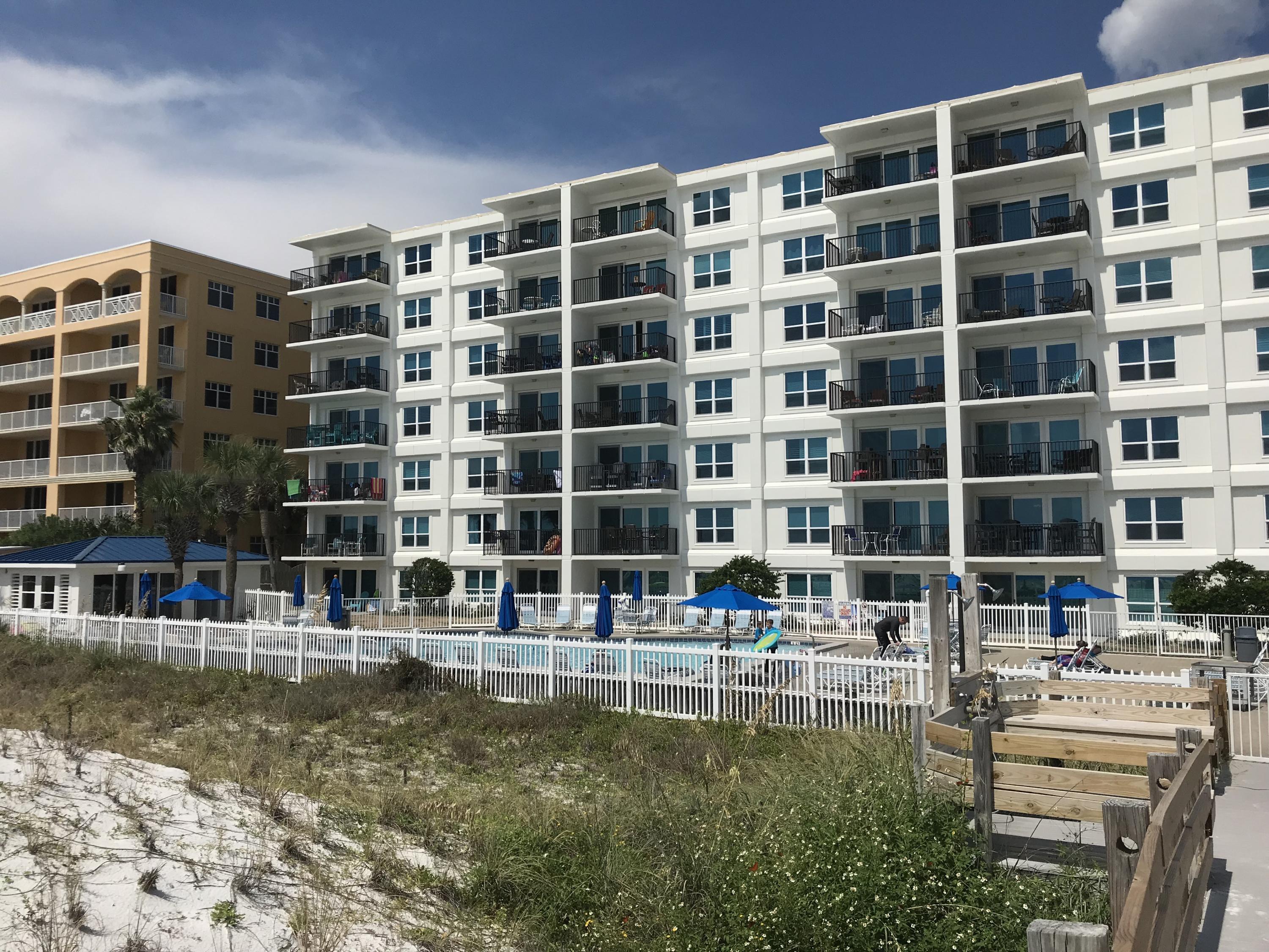 1114 Santa Rosa Boulevard, Unit 102 Fort Walton Beach, FL 32548 - Photo 8 of 23 a view of building with outdoor space