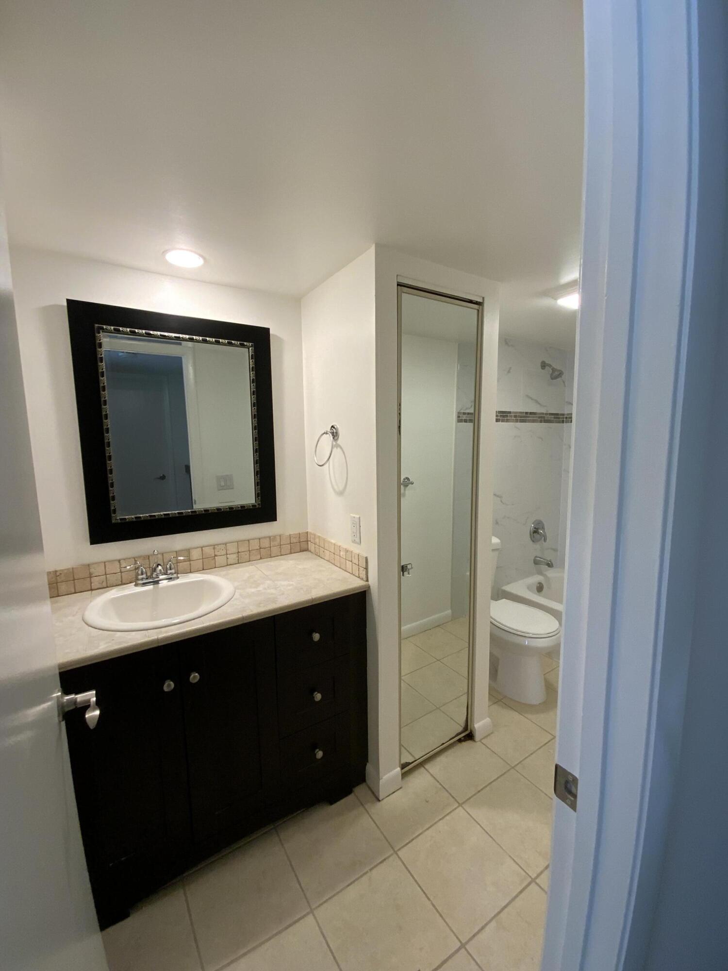 1221 12th Court Jupiter, FL 33477 - Photo 14 of 18 1221 12th Ct 2nd bath 1