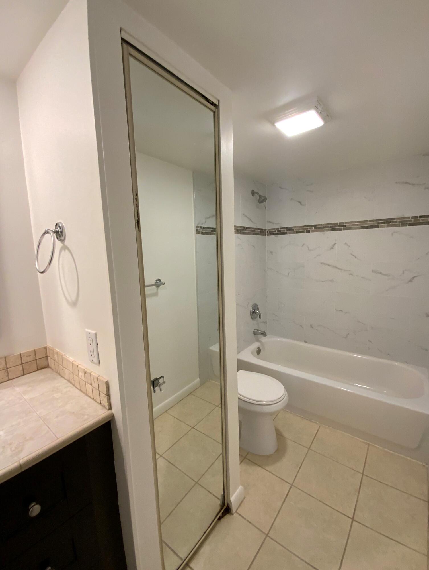1221 12th Court Jupiter, FL 33477 - Photo 15 of 18 1221 12th Ct 2nd bath 2