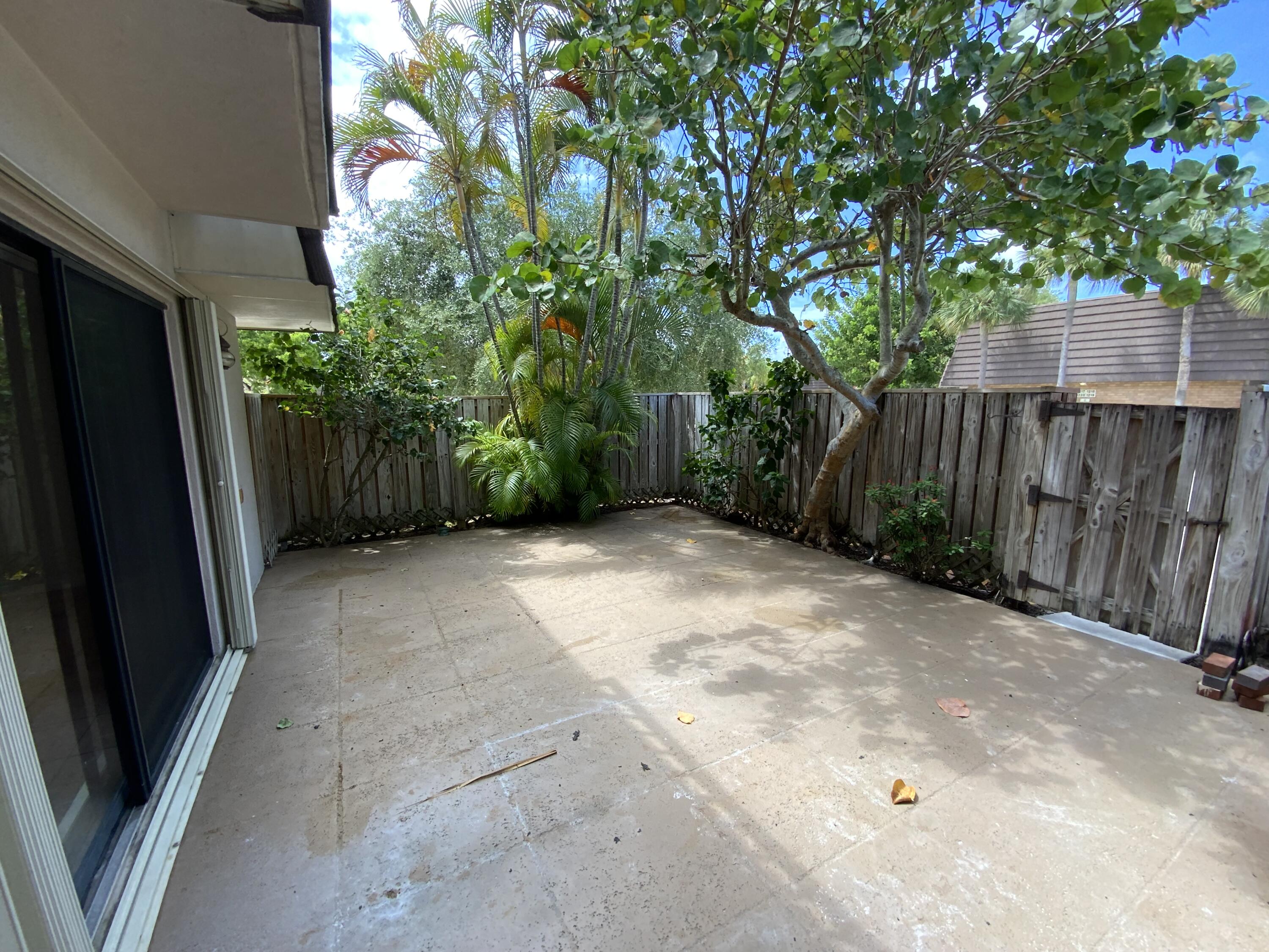 1221 12th Court Jupiter, FL 33477 - Photo 2 of 18 1221 12th Ct patio 1