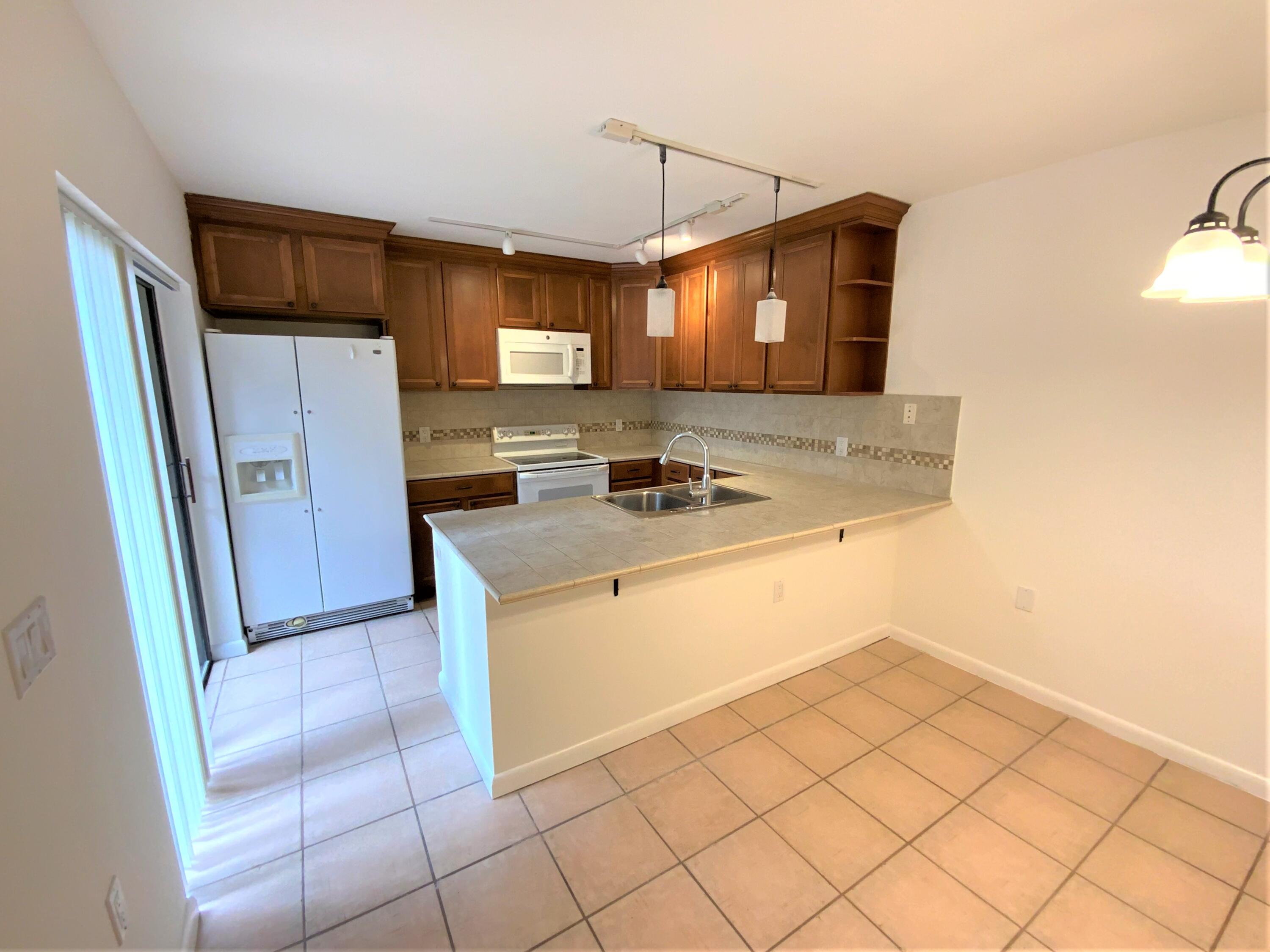 1221 12th Court Jupiter, FL 33477 - Photo 3 of 18 1221 12th Ct kitchen 1