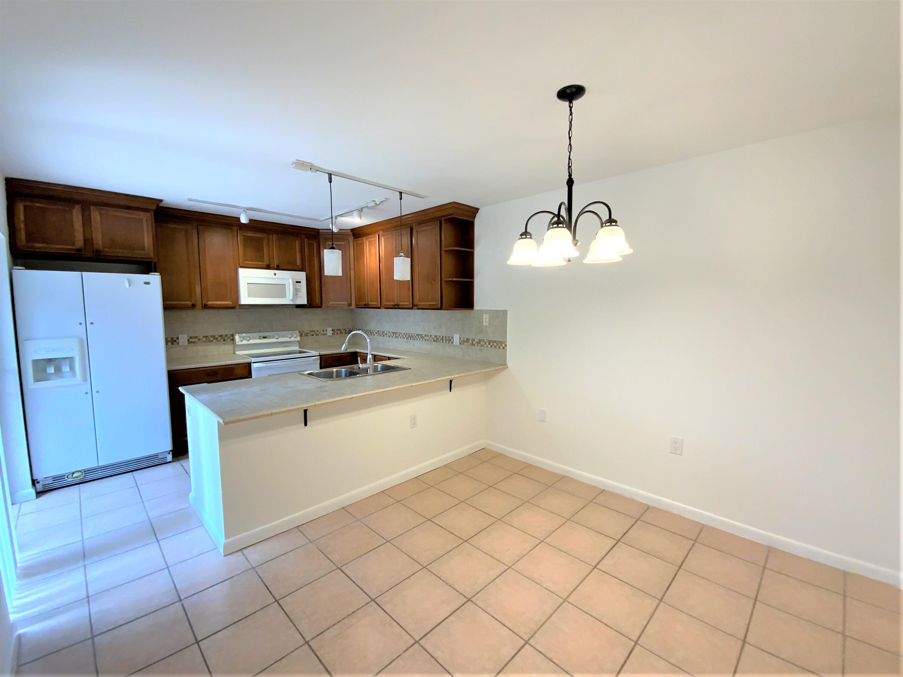 1221 12th Court Jupiter, FL 33477 - Photo 5 of 18 1221 12th Ct kitchen 3