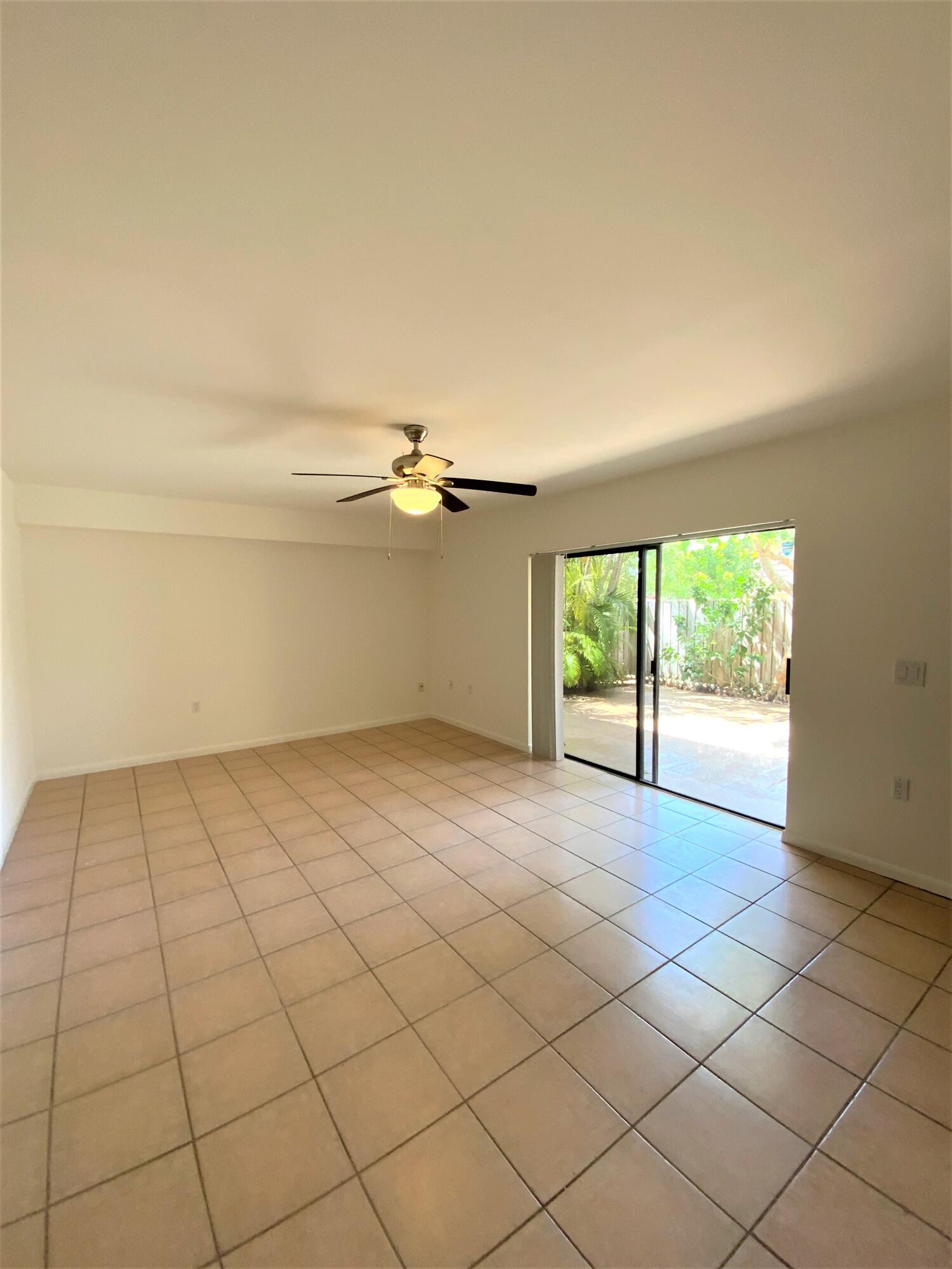 1221 12th Court Jupiter, FL 33477 - Photo 7 of 18 1221 12th Ct living room 3