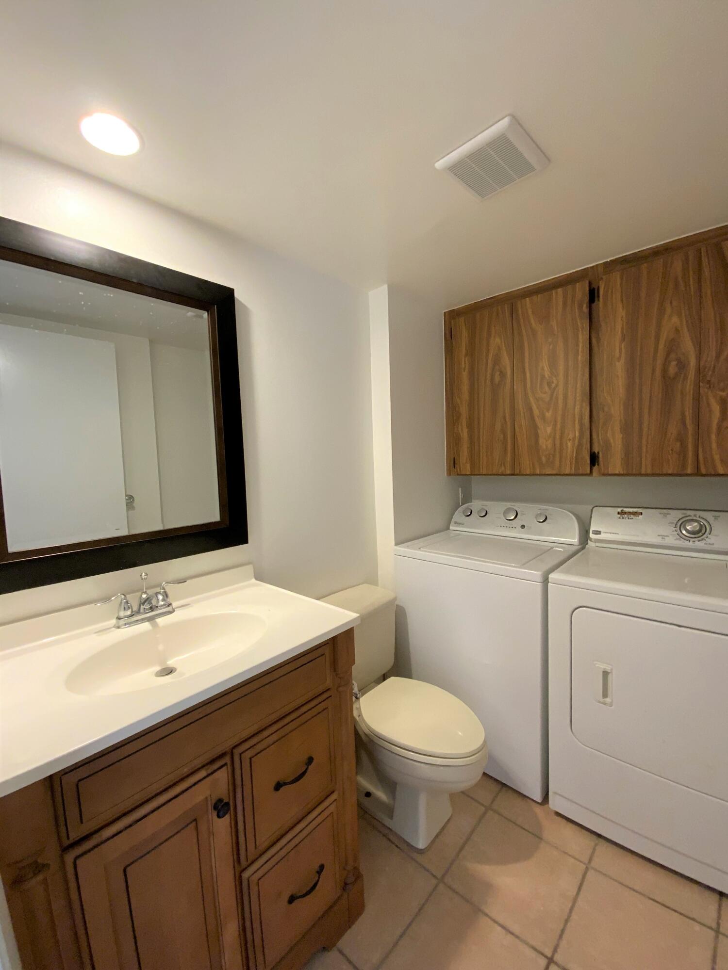 1221 12th Court Jupiter, FL 33477 - Photo 8 of 18 1221 12th Ct powder room laundry